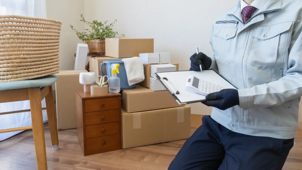 Expert movers handling furniture with care during an apartment relocation.